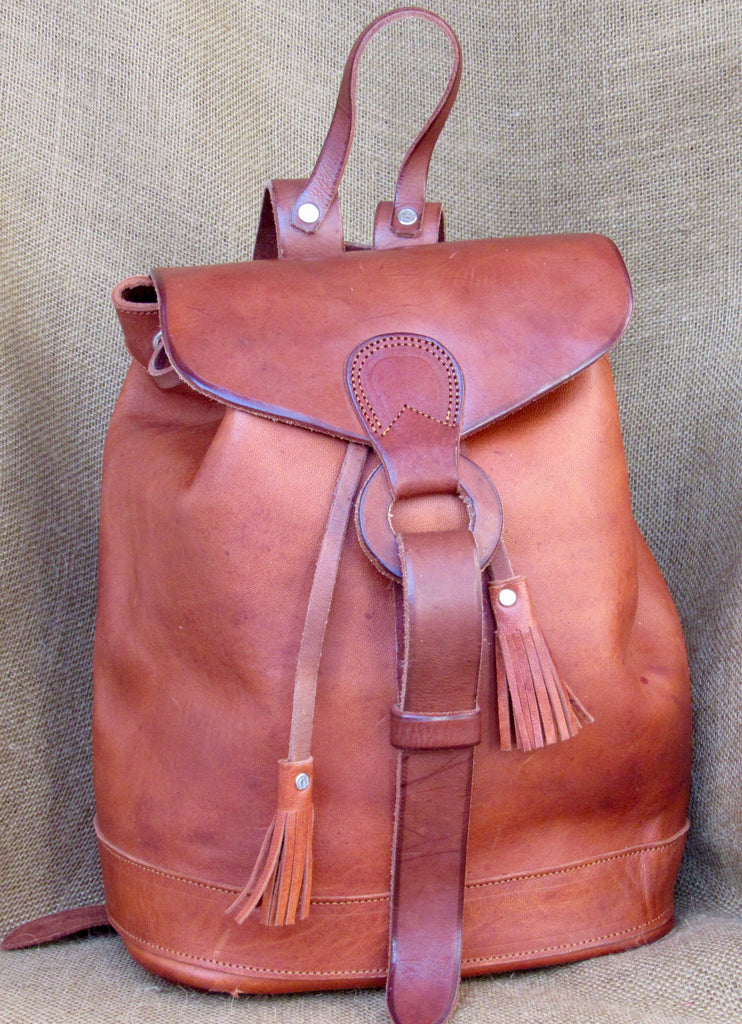 Hand tooled leather discount backpack